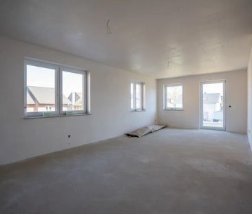 Eine Neubauwohnung mit einem sehr großen Garten und einer tollen Te... - Foto 1