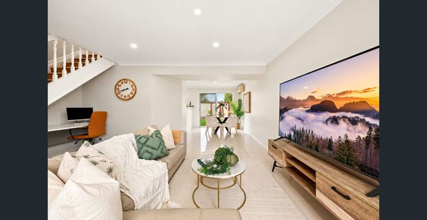 Freshly Updated Townhouse in Secure Gated Complex with Two Swimming Pools! - Photo 1