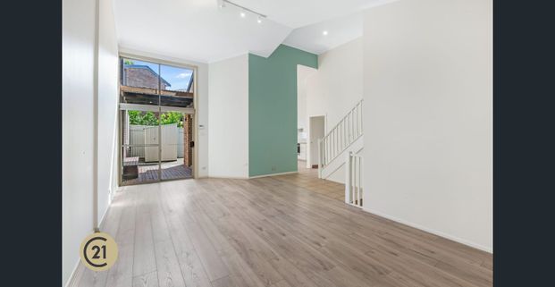 Perfectly Positioned Townhouse in a Prime Location - Photo 1