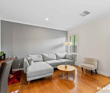 Welcoming Family Home with Open Living Spaces and Home Office - Photo 3