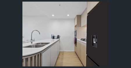 Modern Waterfront Apartment with Panoramic Broadwater Views! - Photo 3