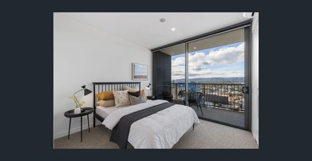 Unfurnished Two-Bedroom Apartment with City-to-Hills Views - Photo 4