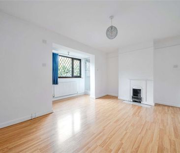 An attractive family home in an ideal location for town, schools an... - Photo 3