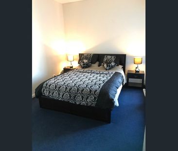 Furnished 1-Bedroom Apartment with City & Street Views - Photo 2