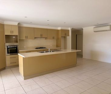 Spacious Coastal Living in Prestigious Tura Beach - Photo 1