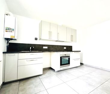 Location Appartement 4 pièces 90m² HAUCOURT MOULAINE 54860 - Photo 2