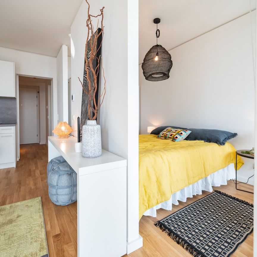 Stylische 1,5-Zi.-Wohnung mit Loggia & Rooftop Pool | TOWER HOMES - Foto 1
