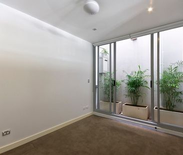 Sophisticated and Stylish Two Bedroom Townhouse - Photo 3