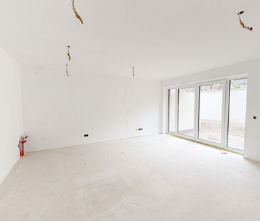Exklusive 2-Zimmer-Neubauwohnung mit Terrasse und Garten in Niedrig... - Photo 1
