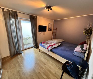 Schicke 2-Zimmer-Erdgeschoss-Wohnung mit schönem Garten und Tiefgaragenstellplatz in beliebter Lage - Foto 1