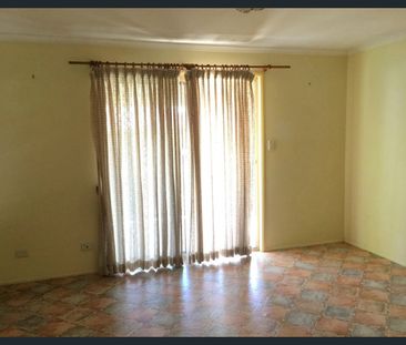 Comfortable Low-Set Brick Home in a Convenient Location - Photo 1