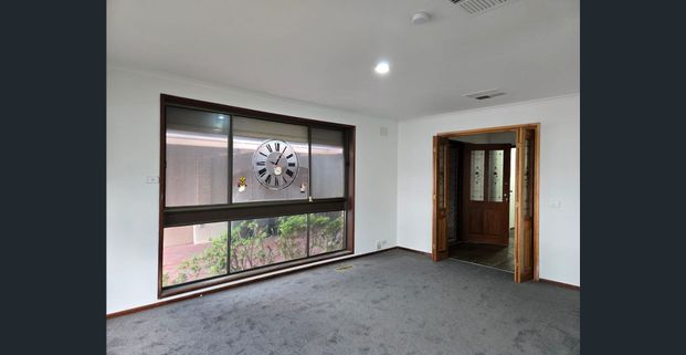 Stylish 4-Bedroom Family Home in Prime Location - Photo 1