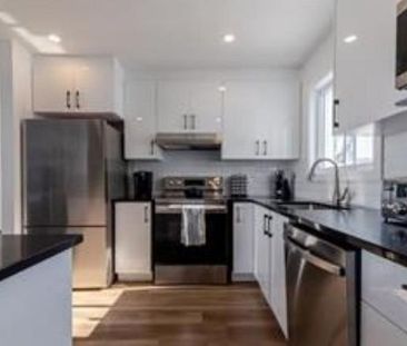 Maison grand 41/2 à louer (Rez-de-chaussé) - Photo 1