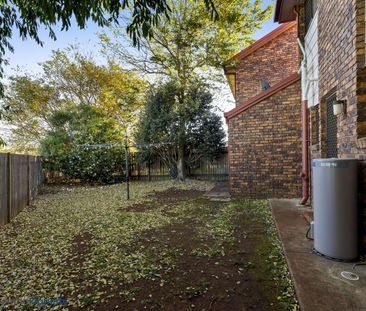 This impeccably presented brick townhouse is sure to impress! - Photo 6