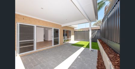 Brand New 4 Bed 2 Bath home with Modern Comforts - Photo 3