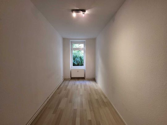 Helle 4-Zimmer-Wohnung mit Terrasse und Garten! - Foto 1