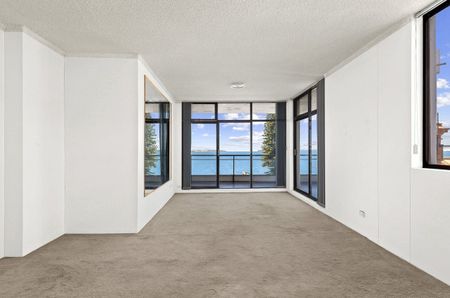 Sun-Drenched Beachside Living with Stunning Water Views - Photo 4