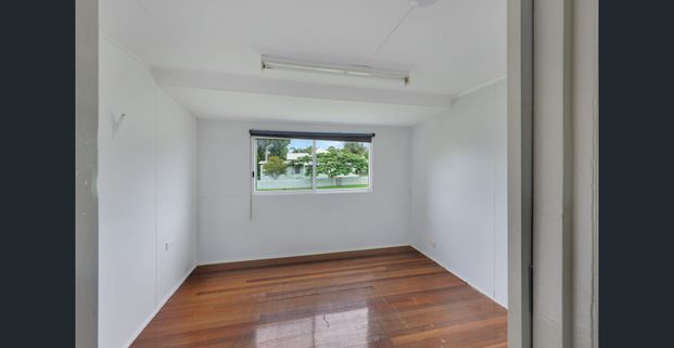 Elevated Living with Garage & Large Yard - Photo 1