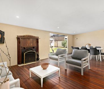 Charming 3-Bedroom Family Home with Modern Comforts and Outdoor Appeal - Photo 2