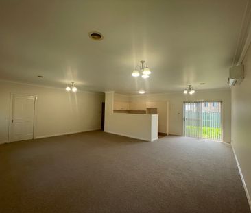 Elegant 2-Bedroom Unit Close to Town - Photo 4