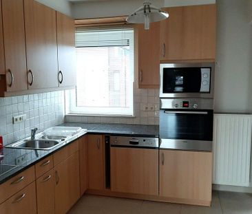 Ruim instapklaar appartement met 2 slaapkamers in hartje Neerpelt - Photo 2