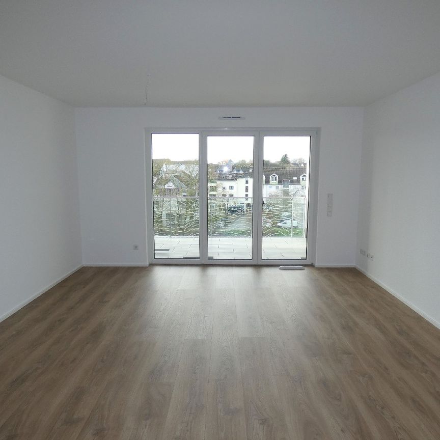 Neubau/Erstbezug: Modern geschnittene 3-Zimmer-Wohnung mit traumhaftem Ausblick - Photo 1