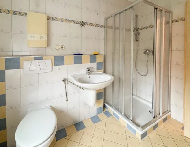 Gepflegte 2-Zimmer-Einliegerwohnung mit separaten Eingang - in ruhiger Wohngegend! - Foto 1