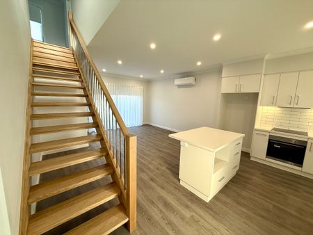 BRAND NEW 2 BEDROOM TOWNHOUSE - Photo 2