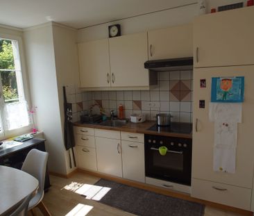 Spacieux appartement de 2.5 pièces en rez-de-chaussée - Photo 2