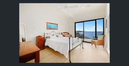 Furnished Beachside Retreat with Breathtaking Ocean Views - Photo 2