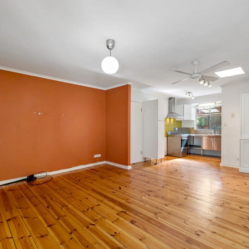 Low maintenance living in popular locale - Photo 1