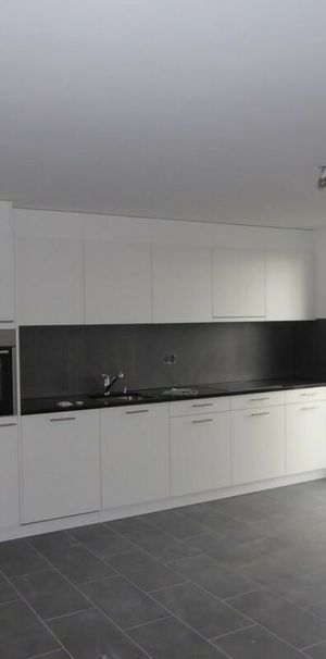 Appartement de 2,5 pièces au rez avec jardin - Foto 2