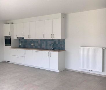 Modieus appartement met 2 slaapkamers en terras in Genk - Photo 5