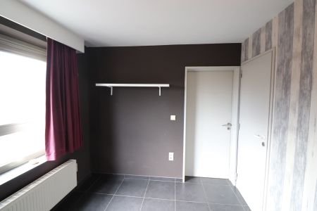 Een gezellig appartement op de eerste verdieping vooraan met autostaanplaats - Foto 2