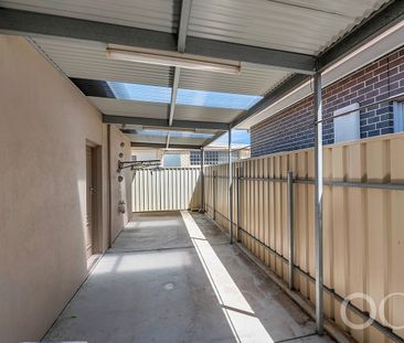 Open the Door to Style, Security, and Location in Woodville South - Photo 4