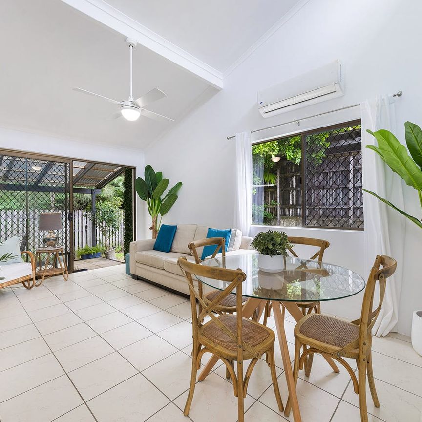 SPACIOUS END UNIT WITH LARGE YARD - Photo 1