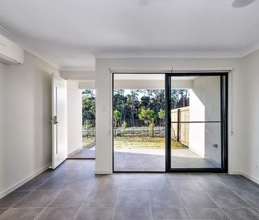 Low-Maintenance Living in a Modern Flagstone Pocket - Photo 1