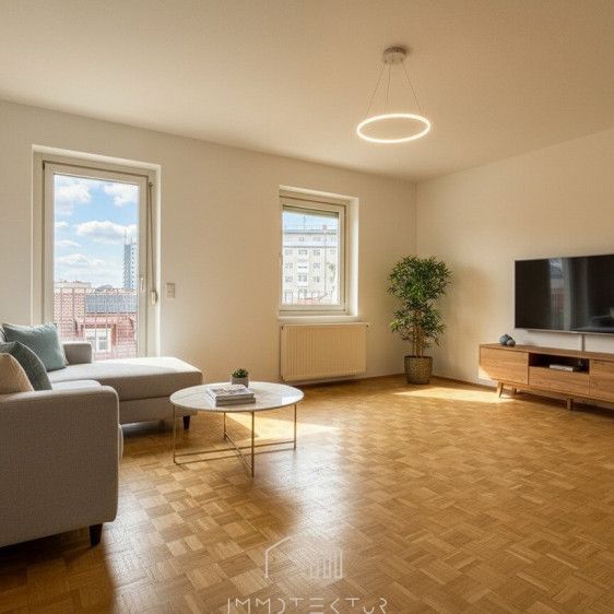 Über den Dächern der Stadt: Modernisierte 1,5-Zimmer-Wohnung mit Schlossberg-Blick! - Photo 1