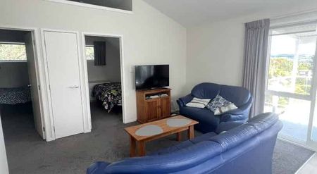 Stylish Fully Furnished Three-Bedroom Rental with Minimal Power Bills - Photo 2