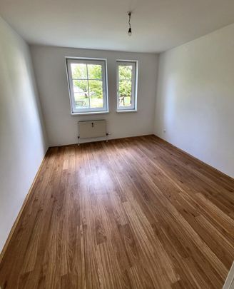 Gemütliche Erdgeschoß-Wohnung - Foto 1