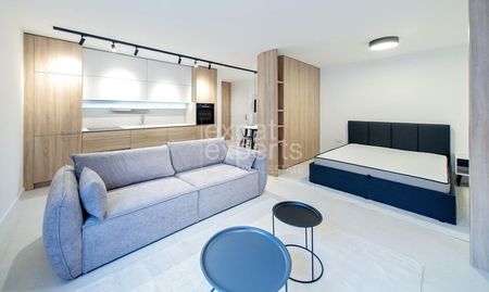 Priestranný 1,5i byt 43m2, s parkovaním vo výbornej lokalite - Photo 2