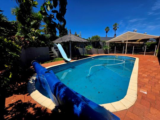 Celebrate the Season in Style: Family Home with Granny Flat & Pool - Photo 1