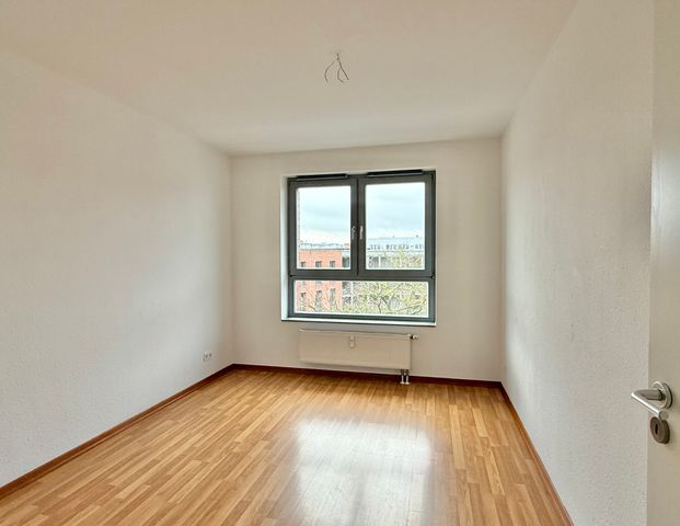 Helle 3-Zimmer-Wohnung mit guter Aufteilung & Balkon - Foto 1