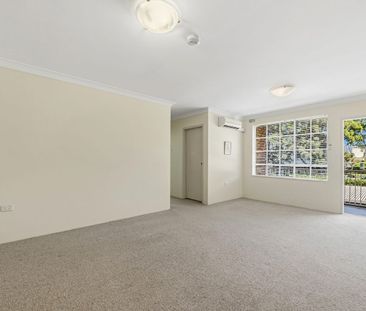 Sunlit Full-Brick Apartment with Quiet Outlook, Pool Access & Walk-... - Photo 1