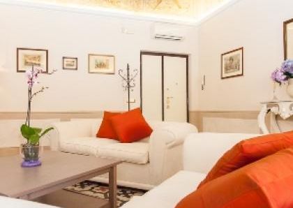 Center-Historic Jewish Quarter: Elegant apartment situated in beautiful Palazzo Nobiliare. Entrance, spacious living with original wood frescoed ceilings, large modern dining and kitchen, 4 bedrooms, 4 Baths, small terrace. #1527