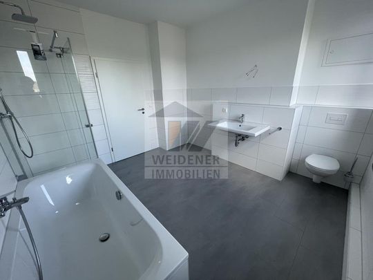 Moderne Wohnung mit Balkon, zwei Bädern und vier Räumen! - Foto 1