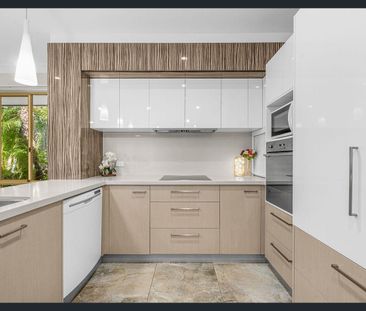 Renovated Family Home with Elevated Privacy and Lush Garden Living - Photo 4