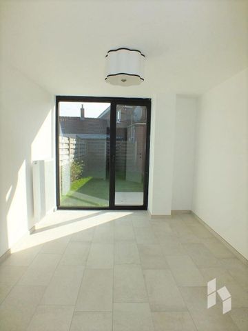 Gelijkvloerse verd. + tuin te huur - Photo 5