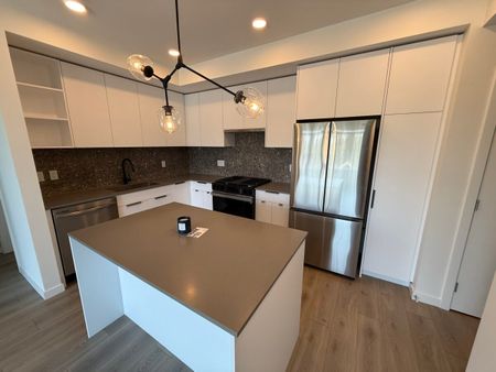 Brand New 3 Bedroom Condo – Half Months Rent Free! - Photo 2
