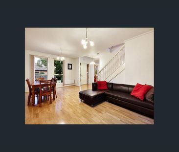 Well-Maintained Townhouse with Fresh Updates in Prime Location - Photo 2